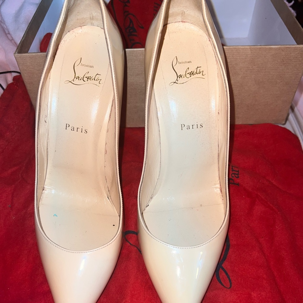 Christian Louboutin Ivory Patent Pointed Toe Pumps. Pigalle Follies 100